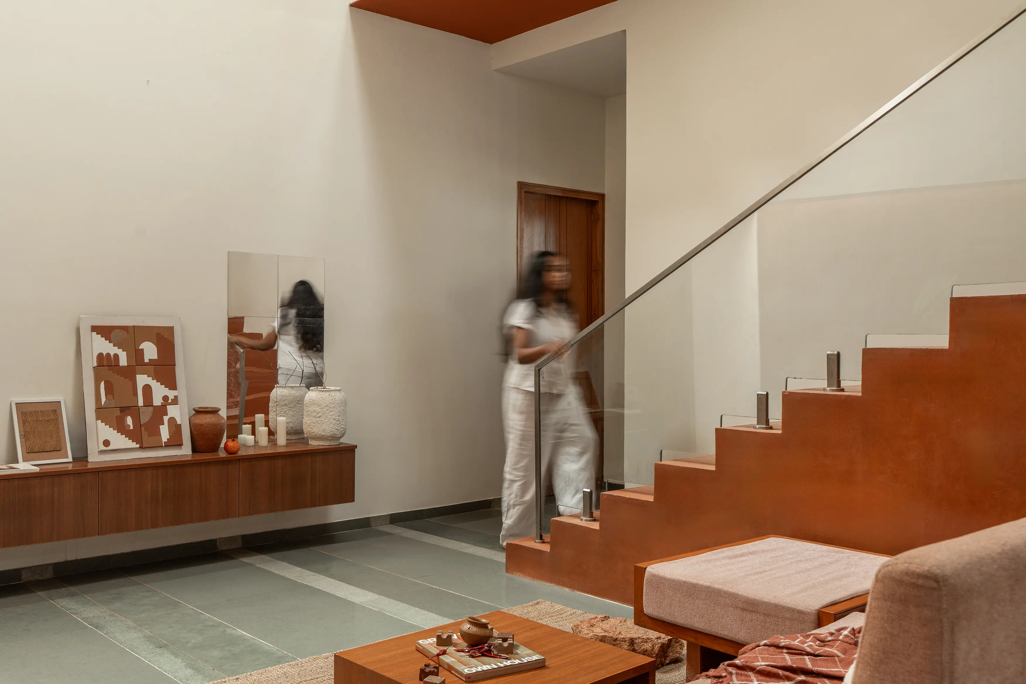 Splitscape Residence staircase and living room
